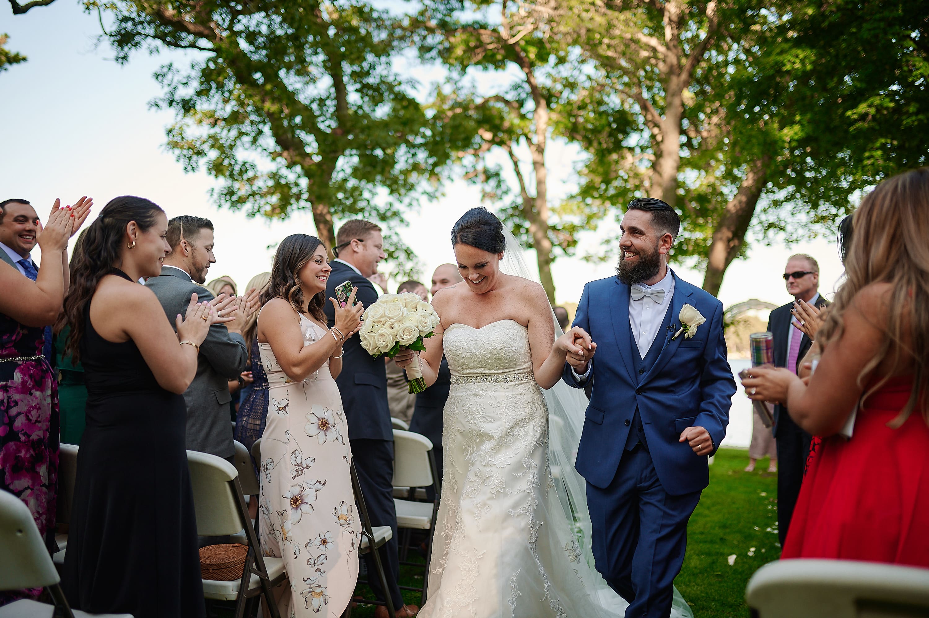 Black and white documentary photo of a wedding reception entrance